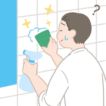 壁の掃除をしているが、きれいになっているか分からない様子のイラスト