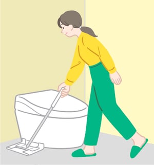 ミニワイパーを使って便器と床の境目を掃除している様子のイラスト