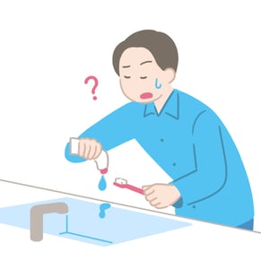 視覚障害者が洗面台でハミガキ粉を歯ブラシののせるのが難しいイラスト